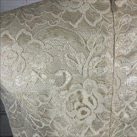 Leslie Fay sleeveless 
Beautiful lace dress with layered ruffles on the end. - Picture 8 of 12